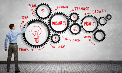 Man presenting teamwork concept . Mixed media