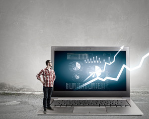 Guy and big laptop . Mixed media