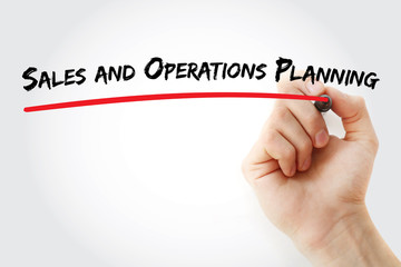 Hand writing Sales and Operations Planning with marker, concept background