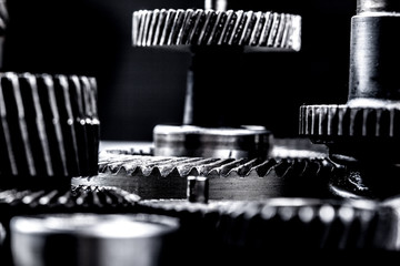 Metal gears on black background