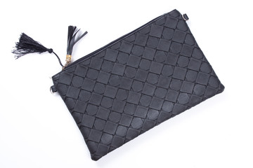 Black handbag isolated on white background.