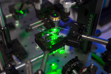 green lasers in the laboratory, laser beams among the optical elements, the study of light and...