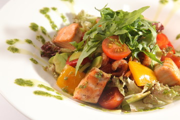 Salad with smoked salmon and vegetables Arugula