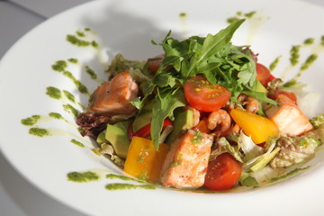Salad with smoked salmon and vegetables Arugula