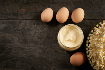 diary products on wooden table copy space