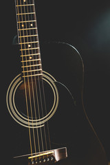 Obraz na płótnie Canvas Acoustic Guitar in black and white the music room