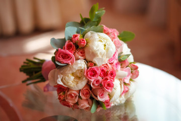 Beautiful peony and rose wedding bouquet, closeup. Marriage concept