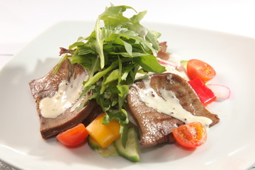 Salad with beef tongue and sauce