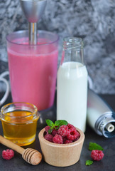 Berry smoothie for breakfast with honey and raspberry