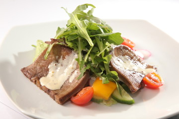 Salad with beef tongue and sauce