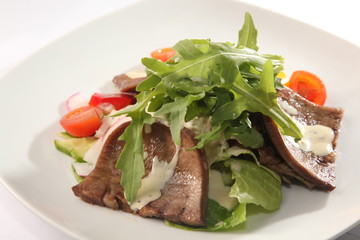 Salad with beef tongue and sauce