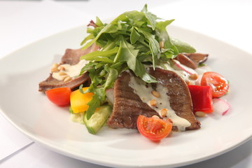 Salad with beef tongue and sauce