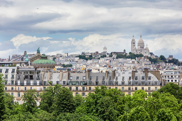 Fototapeta na wymiar Roofs of Paris with Basilique du Sacre Coeur in background, Pari