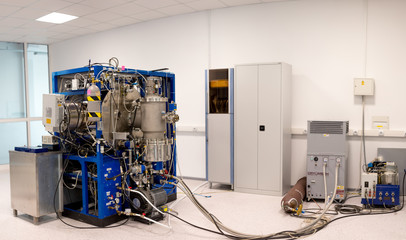 Particle accelerator in the laboratory, a complex instrument, exploring the world of the 21st...