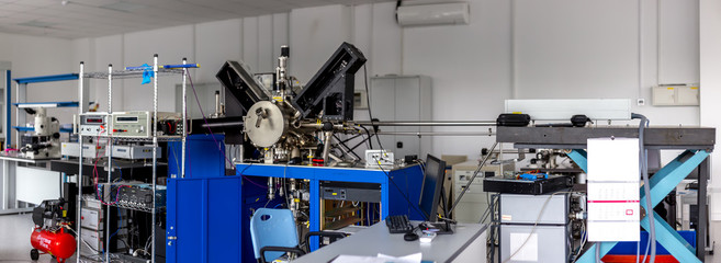 Particle accelerator in the laboratory, a complex instrument, exploring the world of the 21st...