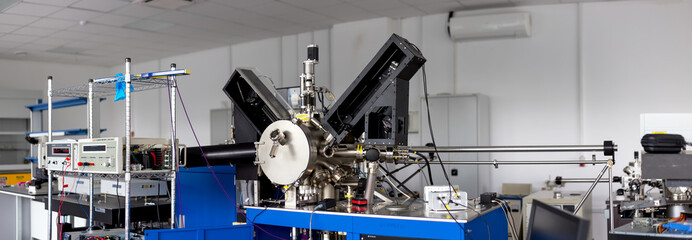 Particle accelerator in the laboratory, a complex instrument, exploring the world of the 21st...