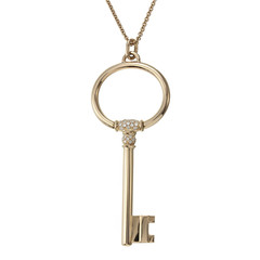 Gold chain with pendant on white