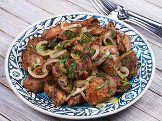 Sauteed chicken liver with apple and onion