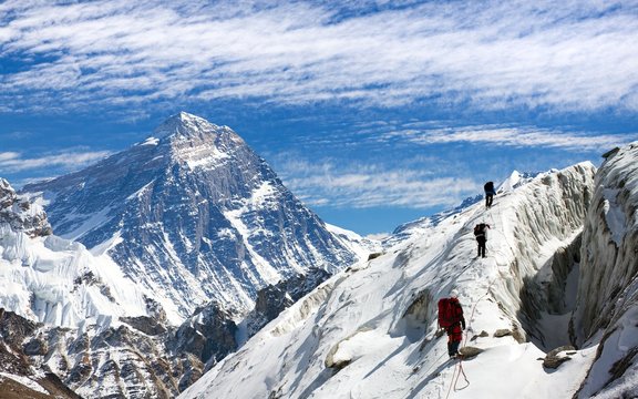 View Of Everest And Lhotse With Group Of Climbers