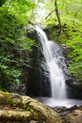 Naklejka premium A waterfall in the Lake District of Cumbria, in Northern England
