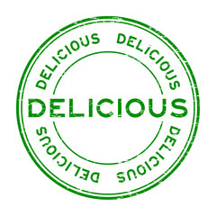 Grunge green delicous rubber stamp