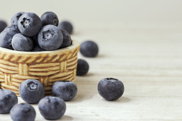 Fresh blueberries on the wooden table