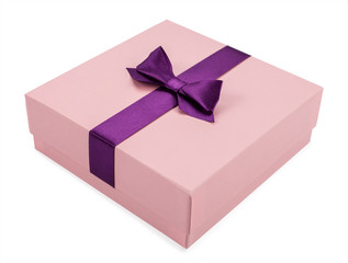 pink gift box with purple ribbon on white