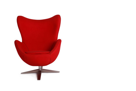 red armchair isolated on white background. one comfortable, modern armchair with textile upholstery. empty space for your text