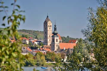 Fototapeta na wymiar Stein an der Donau (district of Krems) seen from the other side of the river Danube