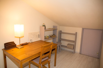 Wooden well arranged desk prepared to work