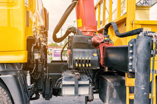 Close Up Of Crane Truck Hydraulic Control. Mechanical Levers Of