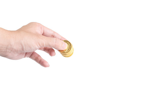 The Chocolate Gold Coin  In Hand On White Background, Clipping Path