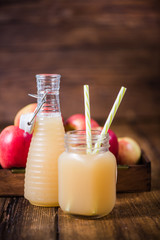 Natural apple juice in vintage jar