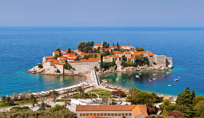 Obraz premium Sveti Stefan or Saint Stefan is a small islet and 5-star hotel resort on the Adriatic coast of Montenegro