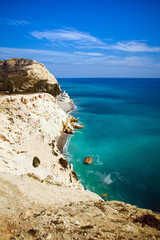 Obraz premium Cyprus coastline. Beautiful view of Mediterranean Sea and mountains landscape on the road to Paphos