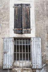 open and closed window shutters in rural France