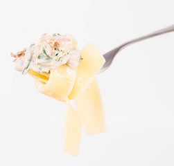 Pappardelle with chanterelle and creame on a fork