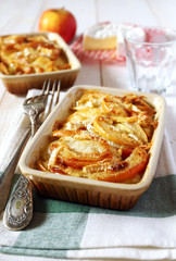 Gratin of potatoes, apples and  Camembert cheese