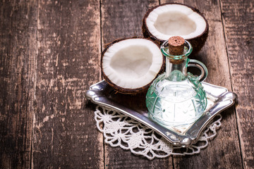 Coconut on wooden table.Vintage filter. Organic healthy food concept.Beauty and SPA concept.