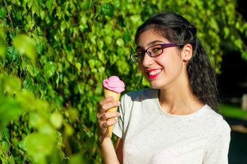 Girl with ice cream on the nature