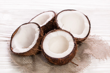 Coconut on wooden table.
