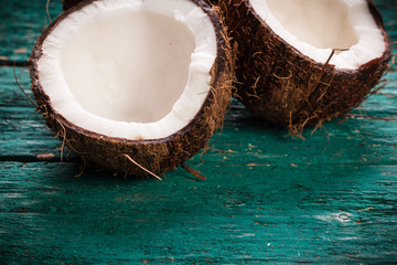 Coconut on wooden table.