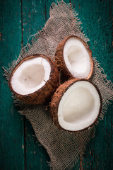 Coconut on wooden table.