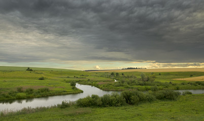 Obraz premium Cloudy summer landscape.River Upa in Tula region,Russia