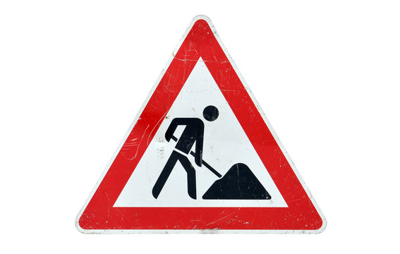 used real road works sign isolated on white