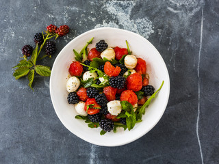 Fruit salad with watermelon, blackberries and mozzarella.