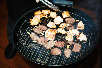 Pieces of meat on the grill