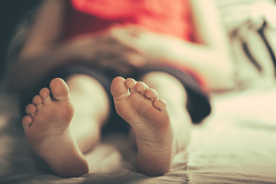 Selective focus on feet of little boy