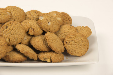 Group of cookies on the plate. Integral Cookies.
