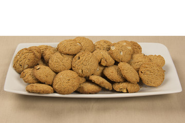 Group of cookies on the plate. Integral Cookies.